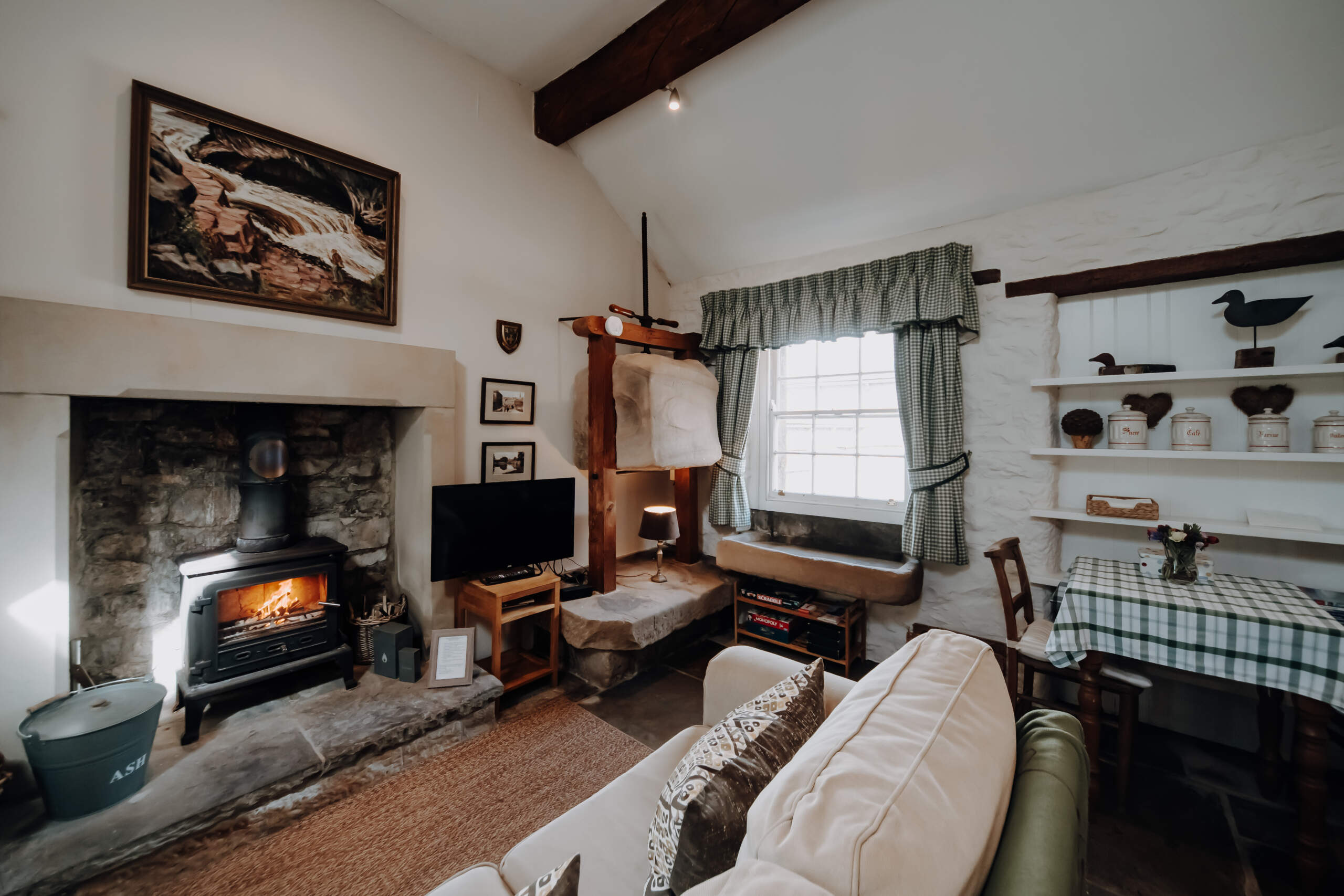 cheese press cottage sitting room with fireplace